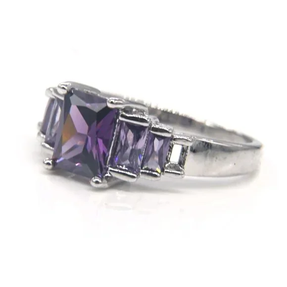 Silver Amethyst ring with baguettes on side. - Picture 2 of 4